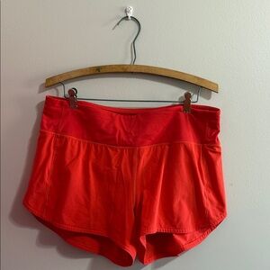 Lululemon Athletica Speed Up Shorts in Carnation Red
